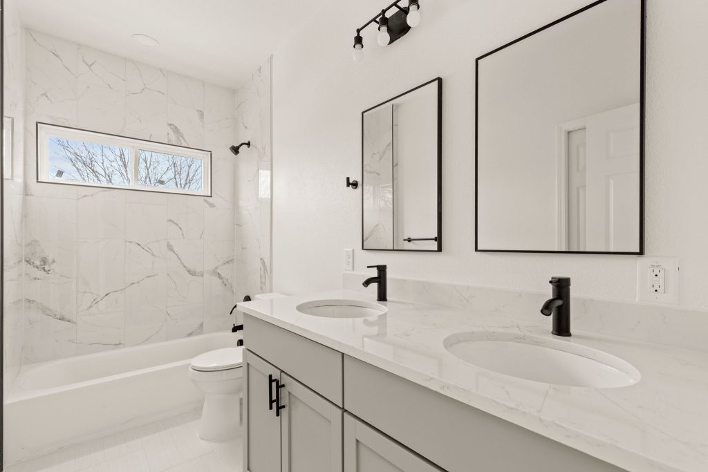ensuite modern bathrooms with walk in shower in our flagship townhome for rent in San Antonio Texas